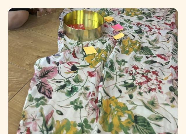 A scarf, a bowl and story cards used as props